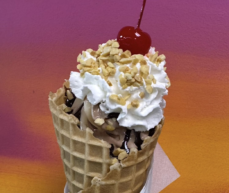 Wafflecone Iceacream with whipcream and cherry